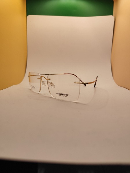 Gold Titanium Rimless Men's Eyeglass Frames - Lightweight & Durable Moretti