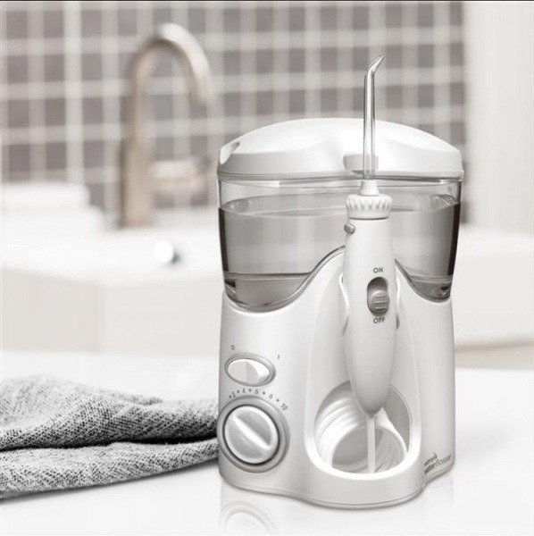 Waterpik WP-100 E2 Ultra White: Professional Water Flosser with 7 Tips & 10 Settings
