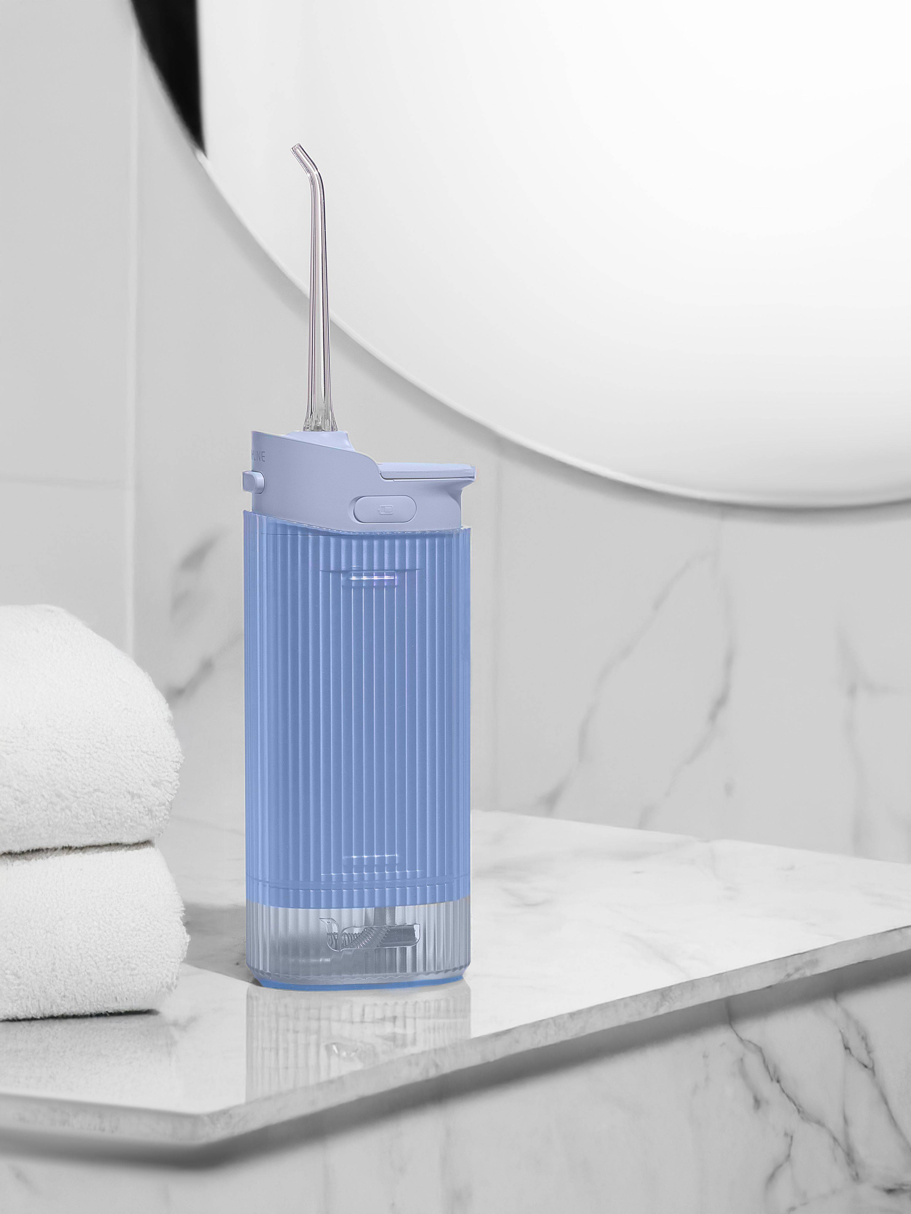 Revyline RL 840 Portable Oral Irrigator with UV Lamp, Blue, Compact, Mini Slider, for Teeth and Braces, Foldable #14